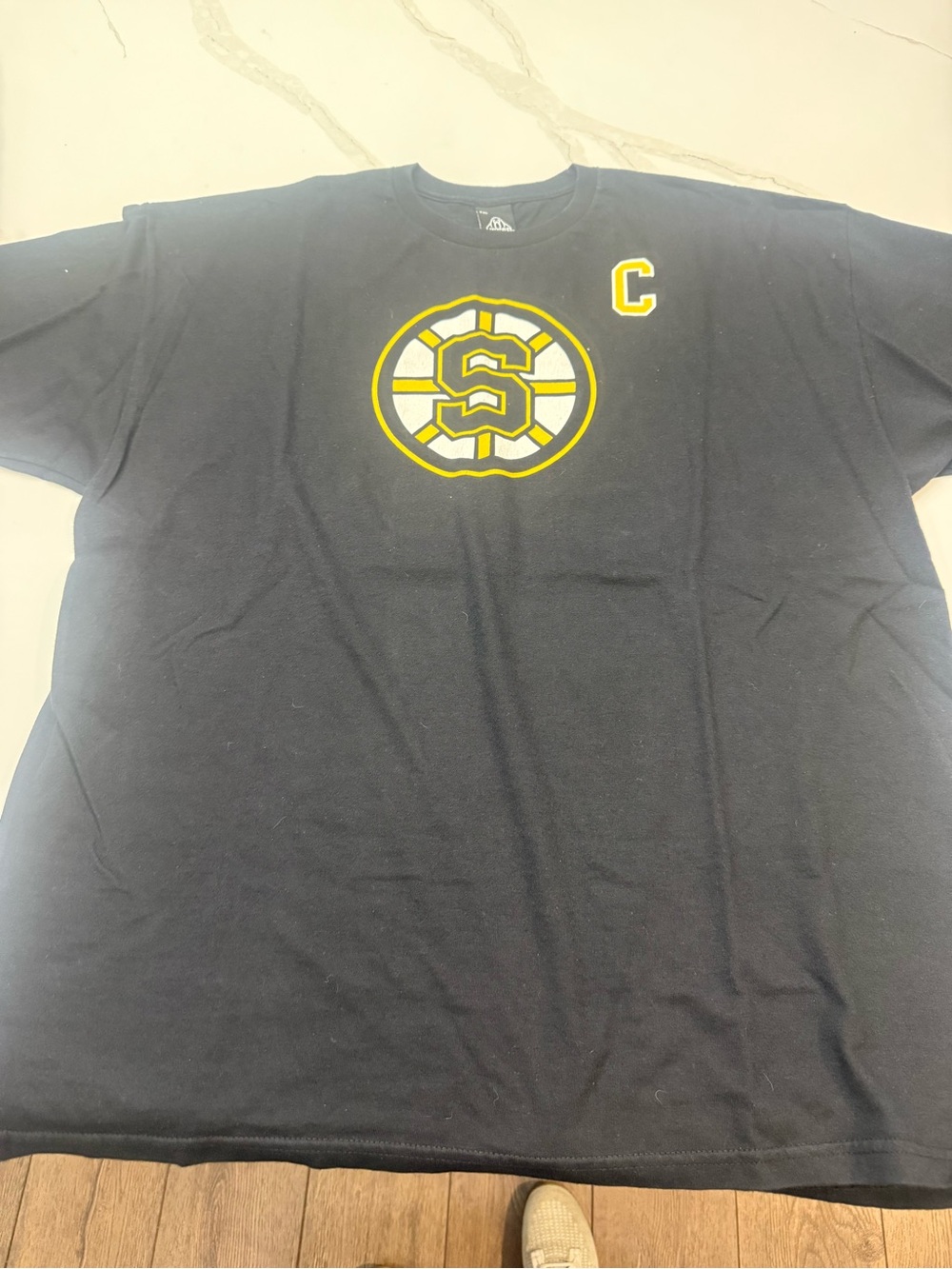 Snoop’s Black Athletic Graphic Tee with Yellow Accent